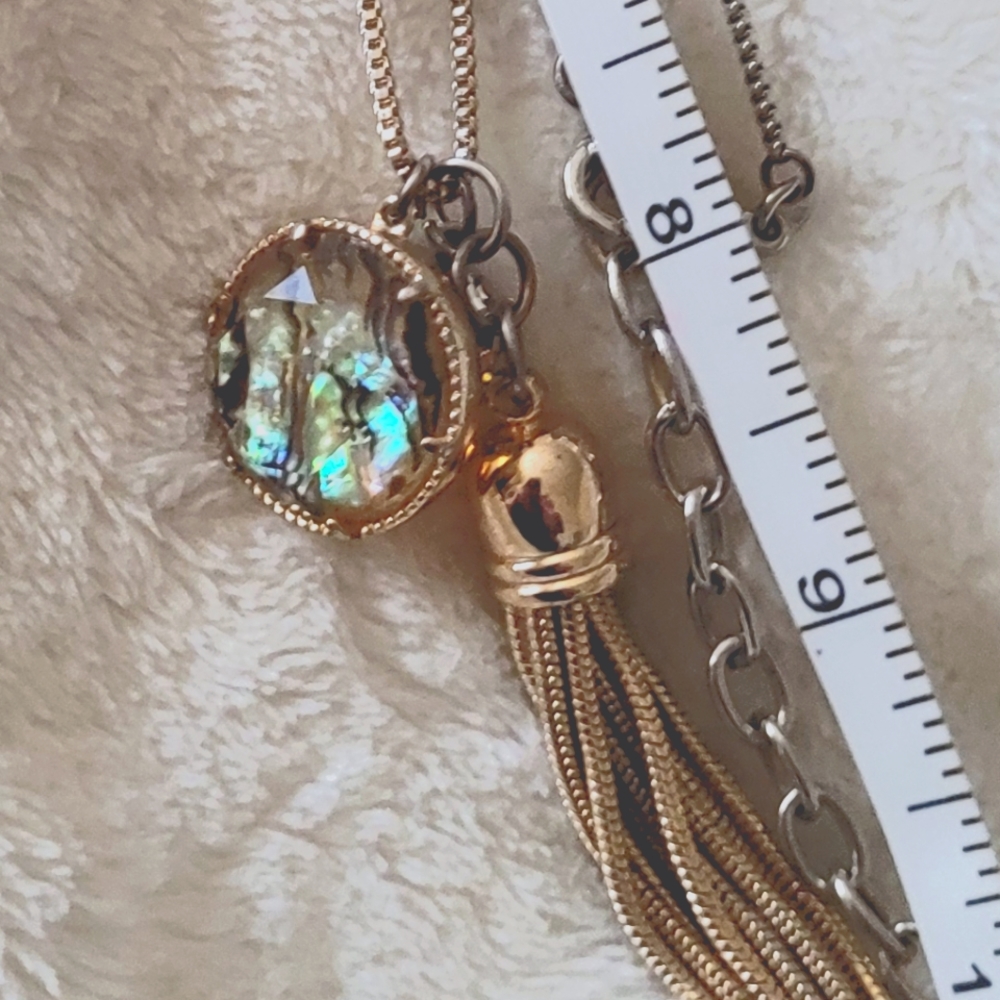 Gold toned Necklace with an Abalone pendant and a "disco ball" bead. Bella/Jack